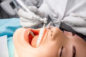 A woman goes in for teeth cleaning in Kohrville, TX