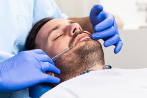 a man receives treatment from a houston sedation dentist