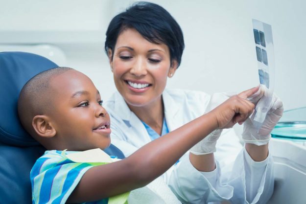 pediatric-dentistry child getting pediatric dentistry