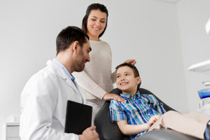 mom and son learning about family dentistry