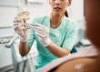 a woman explains the benefit of dental implant